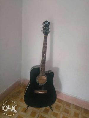 A brand new guitar With new strings Execelent