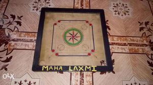 Black And Brown Carrom Board with pises