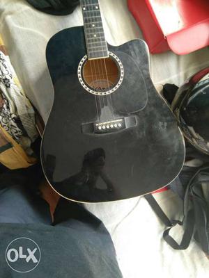 Black colour kaps jumbo guitar in good condition
