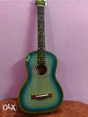 Blue And Green Acoustic Guitar