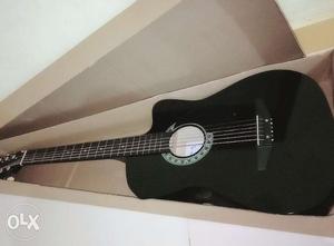 Brand new guitar not used.gifted h Maine use Ni