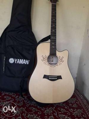 Cutaway Natural Acoustic Guitar With Black Yamaha Gig Bag