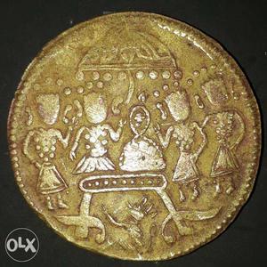 Its a antique Ram darbar token 40 paisa. Pure 12 gram gold