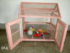 Its a wooden Hut cage which can be used for