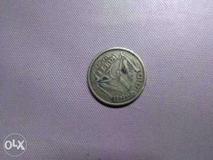 This is a1/2ruppee coin. It is one of the collections