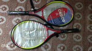 Two Yellow-black-and-red Cosco Tennis Rackets