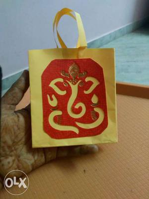 Yellow And Red Paper Bag