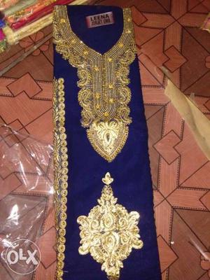Blue And Gold-colored Traditional Dress