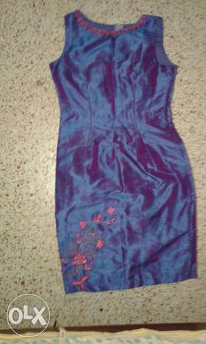 Embroidered silk. size to fit bust 34. length of