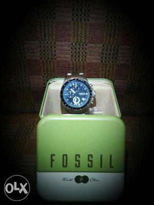 Fossil branded watch with multifunction. Not used.