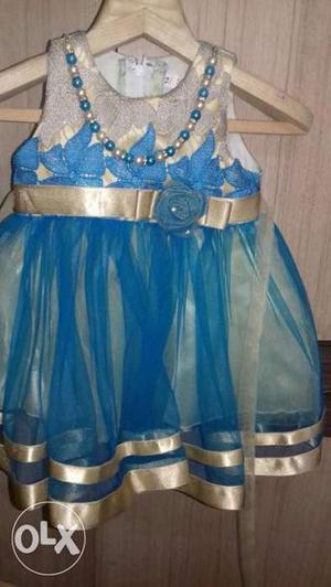 Hi 4sets frocks green and blue my daughter got a birthday