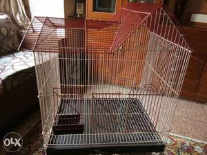 Medium size bird cage. 1.5 ft wide * 1.25 ft deep