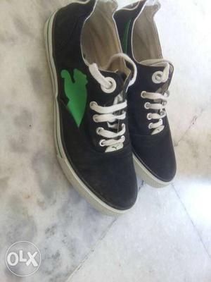 Men's Pair Of Black And Green Sneakers