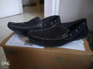 Pair Of Black Leather Loafers