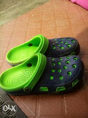 Pair Of Black-and Green Rubber Clog Shoes