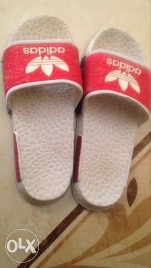 Pair Of Red-and-white Adidas Slide Sandals