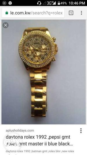 Round Gold Rolex Chronograph Watch With Gold Link Screenshot