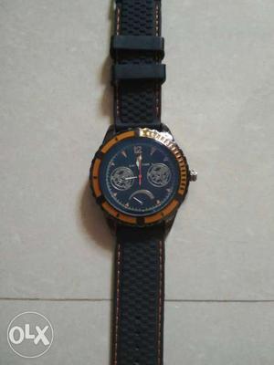 Round Orange And Black Chronograph Watch With Black Bands