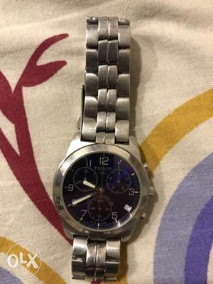 Round Silver-colored Tissot Chronograph Watch With