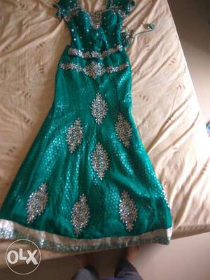 Teal-and-silver-colored Floral Choli And Lehenga Traditional