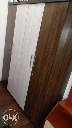 4 door wardrobe with nice wood finish(with self