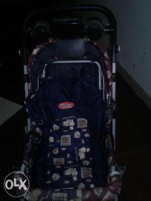 Baby's Blue And White Stroller