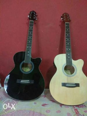 Black And Brown Cutaway Guitars