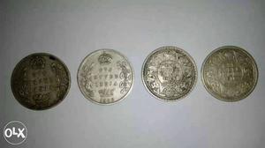 Four Round Nickel Indian Coins