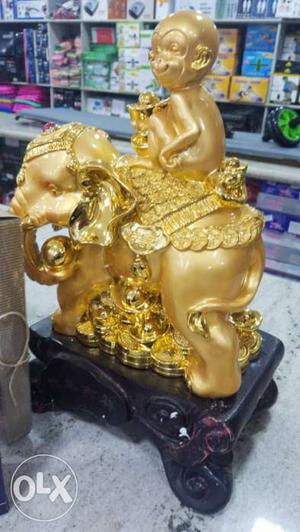Gold-colored Elephant And Monkey Figurine