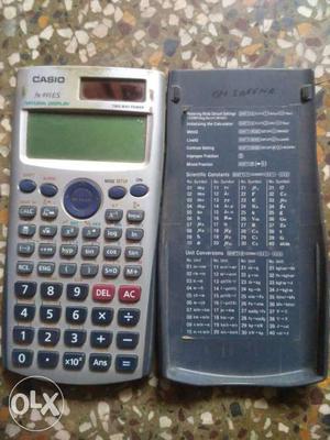 Gray Casio Graphing Calculator With Cover
