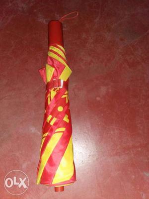 Red And Yellow Umbrella