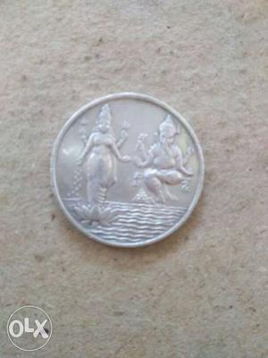 Round Silver-colored Lord Saraswati And Ganesha Embossed