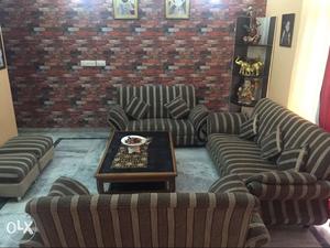 Seven seater sofa set with center table and two