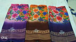 Three Blue, Brown, And Purple Floral Textiles