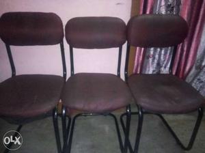 Three Brown Fabric Cantilever Frame Chairs