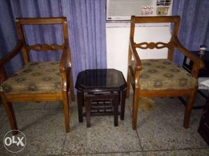 Two Beige Padded Brown Wood-framed Armchairs