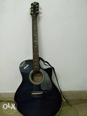 Acoustic guitar with padded bag