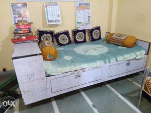 Bed made up of teakwood.