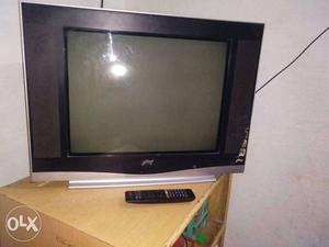 Black CRT TV With Remote Control