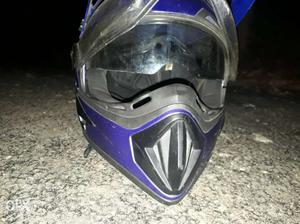 Black, Grey, And Blue Motocross Helmet