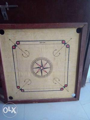 Brown And White Carom Board