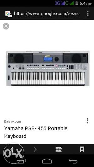 Gray And Black Yamaha PSR- Portable Keyboard