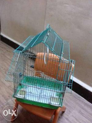 Green And White Metal Pet Cage