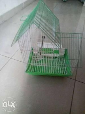 Green bird cage of royal pet make. all functional