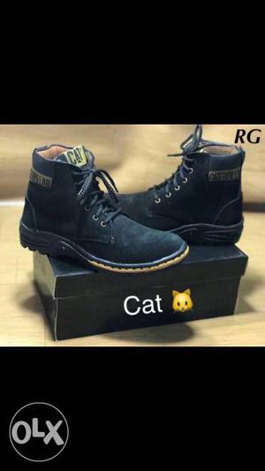 Pair Of Black CAT Boots On Box