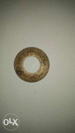 Round Gold-colored Indian 20 paise Coin of 