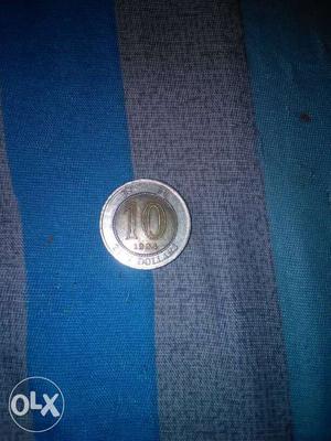 Round Silver And Gold Coin