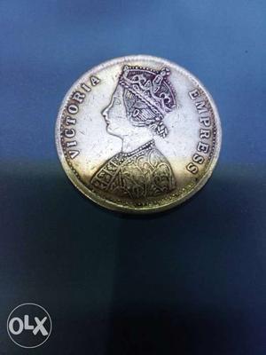 Round Silver-colored Victoria Empress Coin