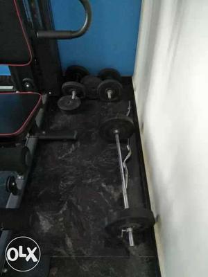 United home gym with 30kgs dumbbells