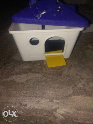 White And Blue Plastic Pet House